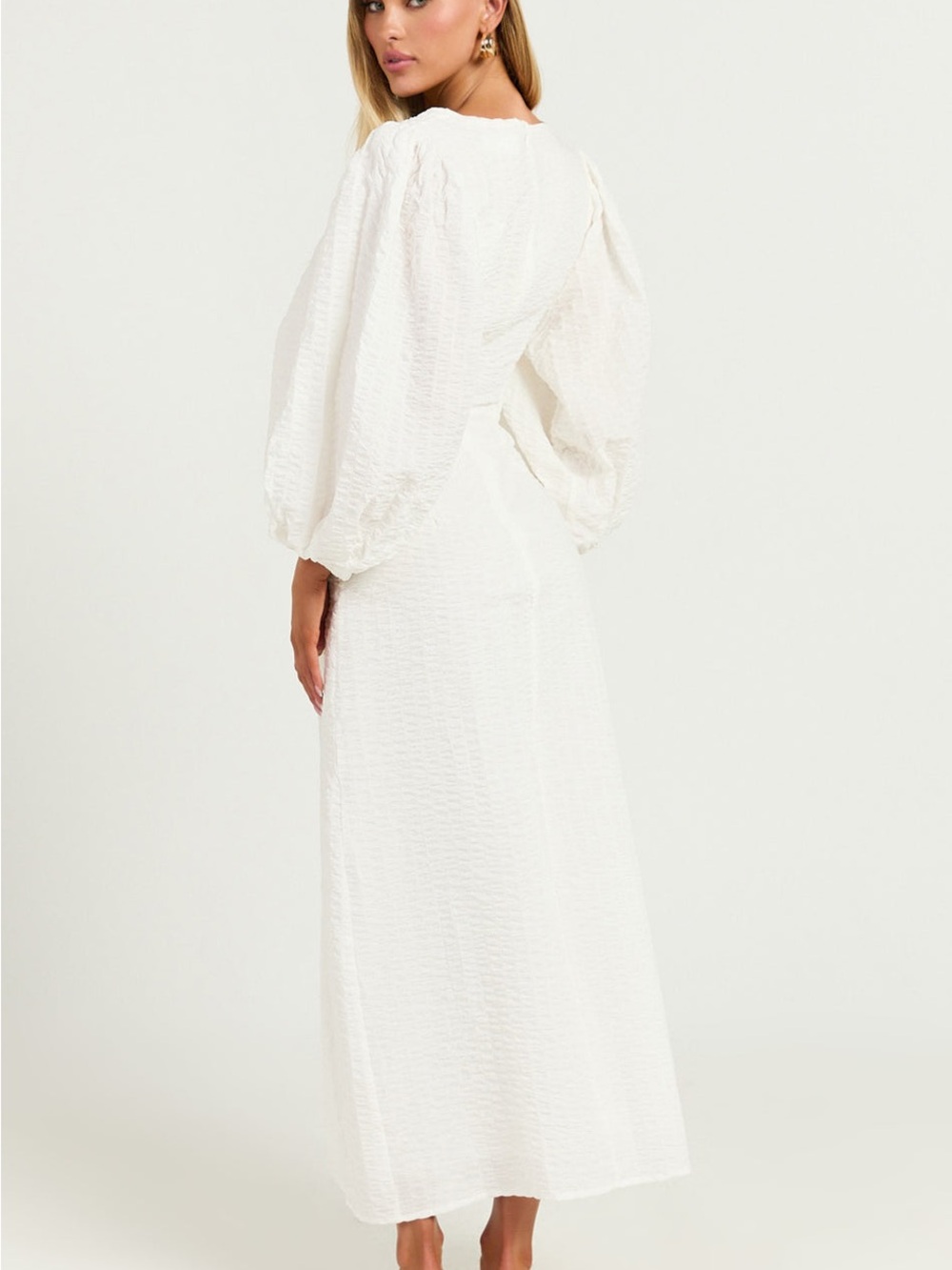 Showpo. Miggy Textured White Cutout Maxi Dress with Puff Sleeves - Picture 5 of 12